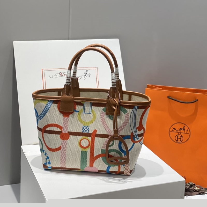 H**mes shopping bags